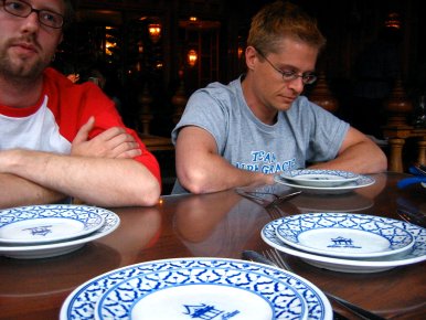 Brian is quite engrossed with his dinnerware